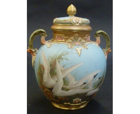 A ROYAL WORCESTER VASE AND COVER, by Charley Baldwyn, dated 1900, of globular form with scroll handles, the domed moulded cov