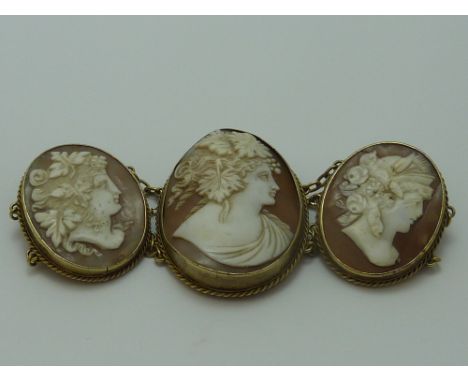 AN ANTIQUE CAMEO BRACELET, with five oval graduated shaped cameos of Greek Goddesses in profile  Condition:slight damage to c