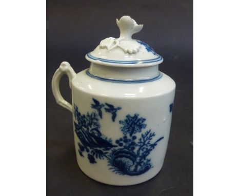 A CAUGHLEY MUSTARD POT AND COVER, circa 1770, of cylindrical shape with scroll handle and flower finial, printed in blue with