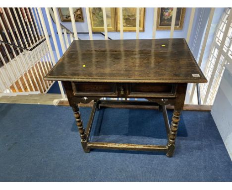 An Antique oak bobbin turned side table