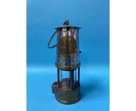 A miners lamp, stamped 'Epp Col'