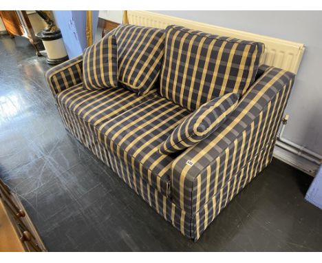 A two seater sofa bed