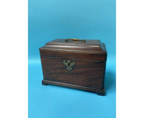 A mahogany tea caddy