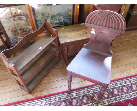 A Regency mahogany hall chair, with waisted reeded back and reeded legs, a carved oak small blanket box and a wall shelf (3)