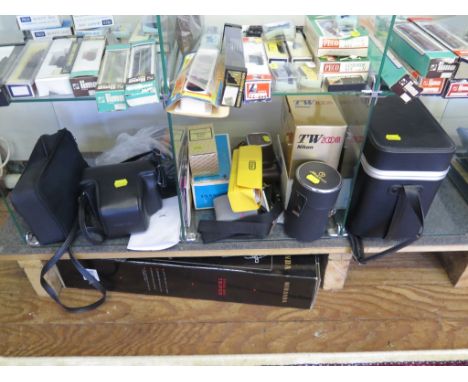 A Nikon TW zoom camera, in original box, a Cine-Kodak Eight Model 20 camera, a Praktica LTL3 SLR camera, and various other ac