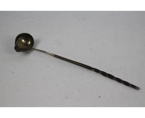 A silver toddy ladle with twist baleen handle, sponsors mark W.W, 38 cm (l)Condition Report: A couple of small tears to the b