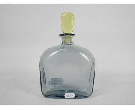 Kosta Boda - A decanter with square section pale yellow stopper, signed to the base, approximately 21 cm (h).Condition Report