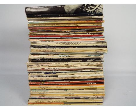 A collection of 12" vinyl records, predominantly blues / jazz and similar, to include Nat Adderley, Count Basie, Duke Ellingt