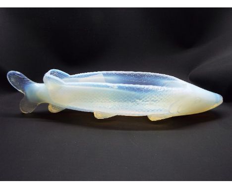 A Molineaux, Webb & Co opalescent glass flower trough in the form of a pike, approximately 25 cm (l).Condition Report: Regist