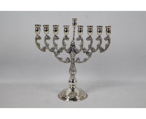 Judaica - A 925 fineness white metal Hanukkah menorah with nine lights, stamped 925, 29 cm (h), approximately 300 grams / 9.6