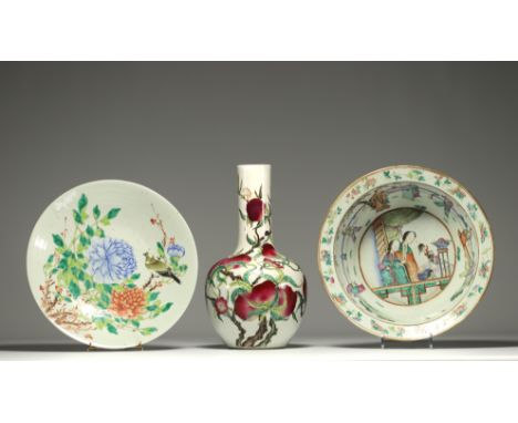 China - Set of three polychrome porcelain pieces, a 19th century plate decorated with flowers and a bird, a 20th century bott