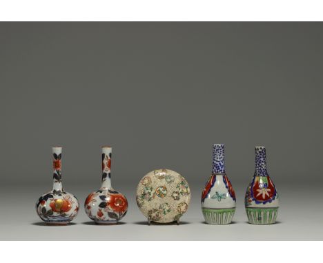 Japan - Set of four vases and an ink box. A pair of small Imari vases, a pair of small bottle vases and an ink box with flora