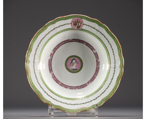 China - Compagnie des Indes porcelain plate, scalloped rim, bust of the goddess Athena and family coat of arms. A chip on the