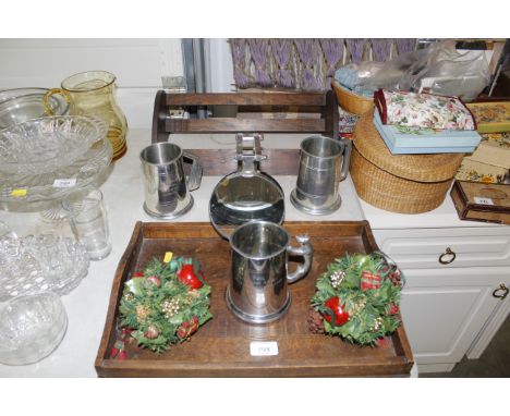 A wooden tray, a book trough, a desk magnifying glass, tankards etc.