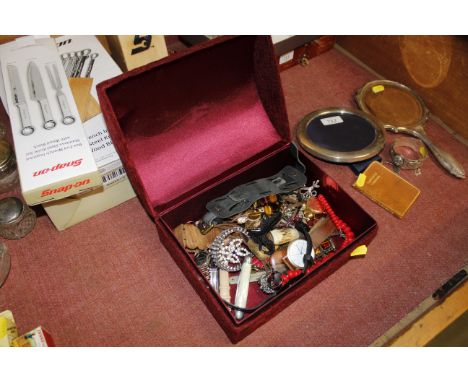 A dome topped trinket box and contents of various costume jewellery, dress rings, wrist watches etc.