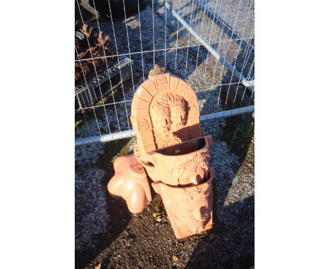 Two plastic wall mounting planters in the form of King and Queen, a similar plastic wall mounting plant trough etc