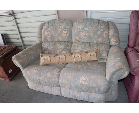 A two seater reclining sofa 