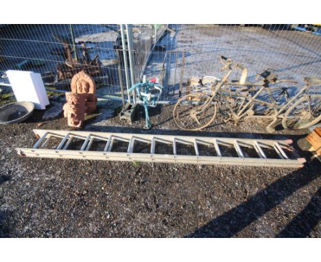 An extending aluminium ladder