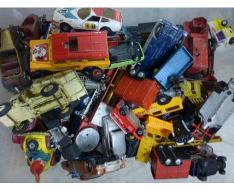 Quantity of vintage play worn die-cast vehicles including Corgi, Dinky and Matchbox featuring Corgi Batmobile, Corgi Chitty C