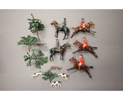 Collection of vintage lead Hunting figures including five horses with riders, three hounds, a fox and trees