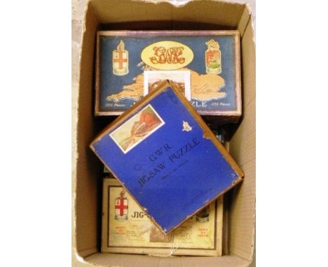 Nine vintage jigsaw puzzles including GWR x 5, Thomas the Tank Engine etc