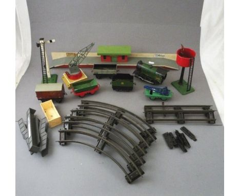 Quantity of Hornby O gauge including engine with tender in green livery, crane, three items of rolling stock, signal, water t