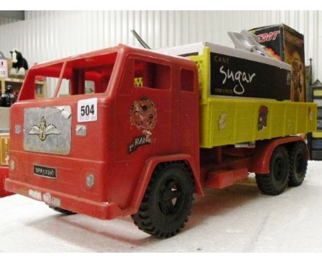 Group of vintage toys including two tin plate birds, a boxed Battery Operated Forcebot and a large plastic truck