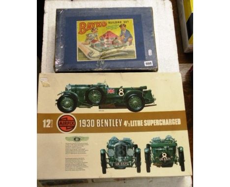 Boxed Airfix 12th scale 1930 Bentley 4 1/2 litre supercharged, appears complete with sealed bags plus a boxed Bayko Building 