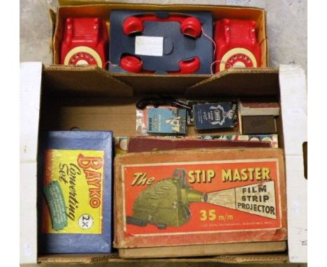 Group of vintage boxed games including The Stip Master film strip projector, Bayko Converting Set 2x, various card games etc