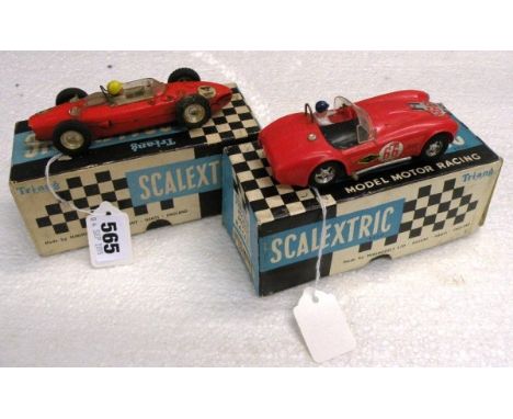 Two boxed Triang Scalextric slot cars including C62 Ferrari with rear engine in red and C56 Lister Jaguar in red (fair - gd)