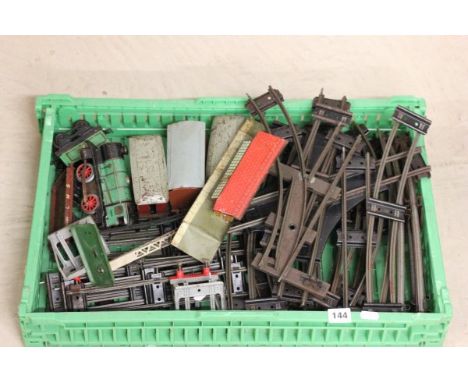 Quantity of Hornby O gauge model railway including engine and tender in green livery, platform, rolling stock, signal and tra