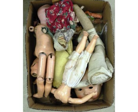 Box of vintage doll spare parts including bisque and composition