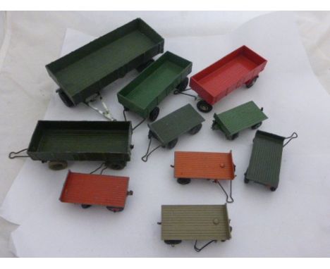 Ten vintage Dinky die-cast trailers 