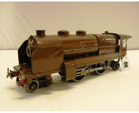 Hornby clockwork O gauge Nord engine locomotive in brown livery, fair with two wheels missing