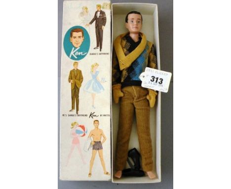 Boxed Mattel 1961 Ken Barbie doll 750 in Ski Fun Outfit (no cap) in good condition, box has one side and one end flap away at