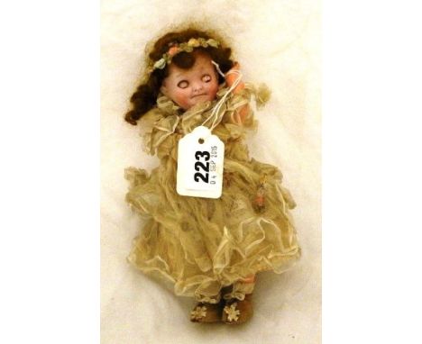 Plastic body 7 1/2" doll by Strobal & Wilkins with bisque head