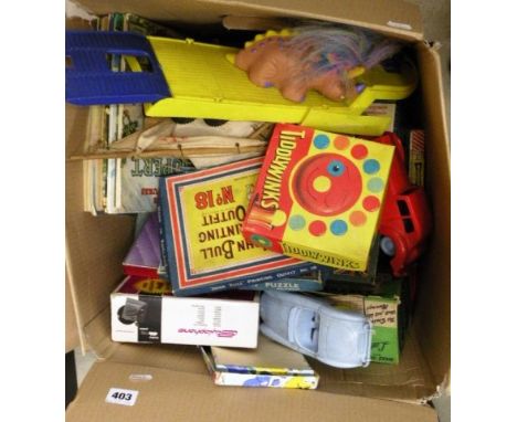 An interesting collection of vintage toys and games including John Bull Printing sets, boxed Childs Salter Scales, Rupert ann