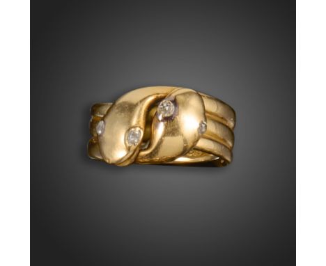 A Victorian diamond-set gold snake ring, the double-headed snake set in gold, with old circular-cut diamond-set eyes, stamped