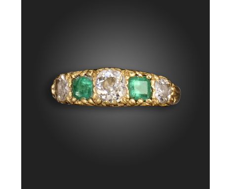 An emerald and diamond gold half-hoop ring, set with three old cushion-shaped diamonds and two emerald-cut emeralds in a pier