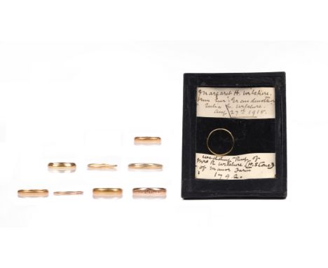 Nine gold rings, late 18th - early 19th century, including seven gold wedding rings, one gold mourning ring with external ins