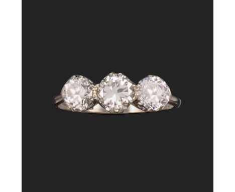 A diamond three-stone ring, set with three round brilliant-cut diamonds in platinum, diamonds approximately 0.50, 0.70 and 0.