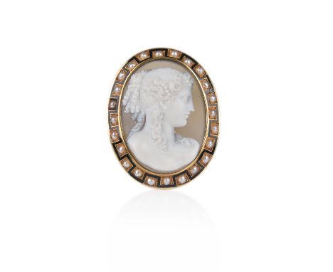 A Victorian hardstone cameo-mounted gold brooch, the cameo depicting a maiden in profile with pearls in her curling hair, in 