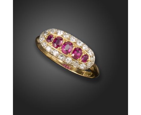 An Edwardian ruby and diamond cluster ring, set with graduated cushion-shaped rubies, within a border of single-cut diamonds 