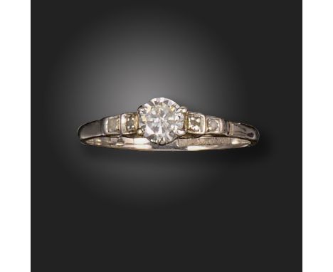 A diamond solitaire ring, the round brilliant-cut diamond weighs approximately 0.50cts, with circular-cut diamonds to each sh