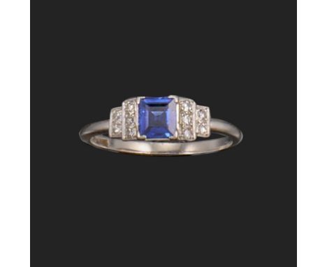 An early 20th century sapphire and diamond ring, set with a square-shaped sapphire, with five single-cut diamonds to each ste