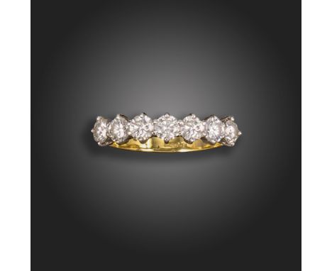 A diamond seven-stone ring, set with seven round brilliant-cut diamonds in gold, diamonds approximately 1.60cts total, size S