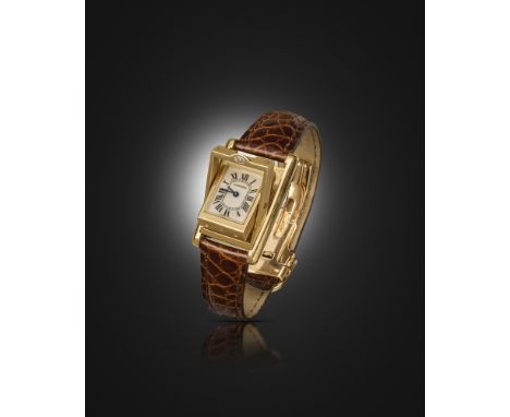 A gold 'Tank Basculante' wristwatch by Cartier, signed dial with secret signature at X, the plain gold reverse face with diam