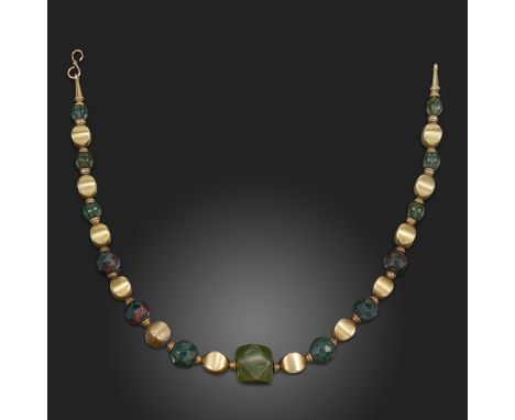 A 19th century Archaeological Revival necklace, attributed to Carlo Giuliano, 1880s, alternately mounted with graduated facet