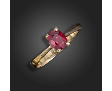 A ruby solitaire ring, claw-set with an oval ruby weighing 1.14 carats, size N1/2, stamped 750, indistinct maker's mark Accom