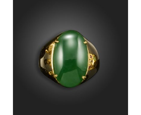 A gold and jade ring, the green jadeite cabochon claw-set in a tapered gold ring, size T Accompanied by report number 80236-6